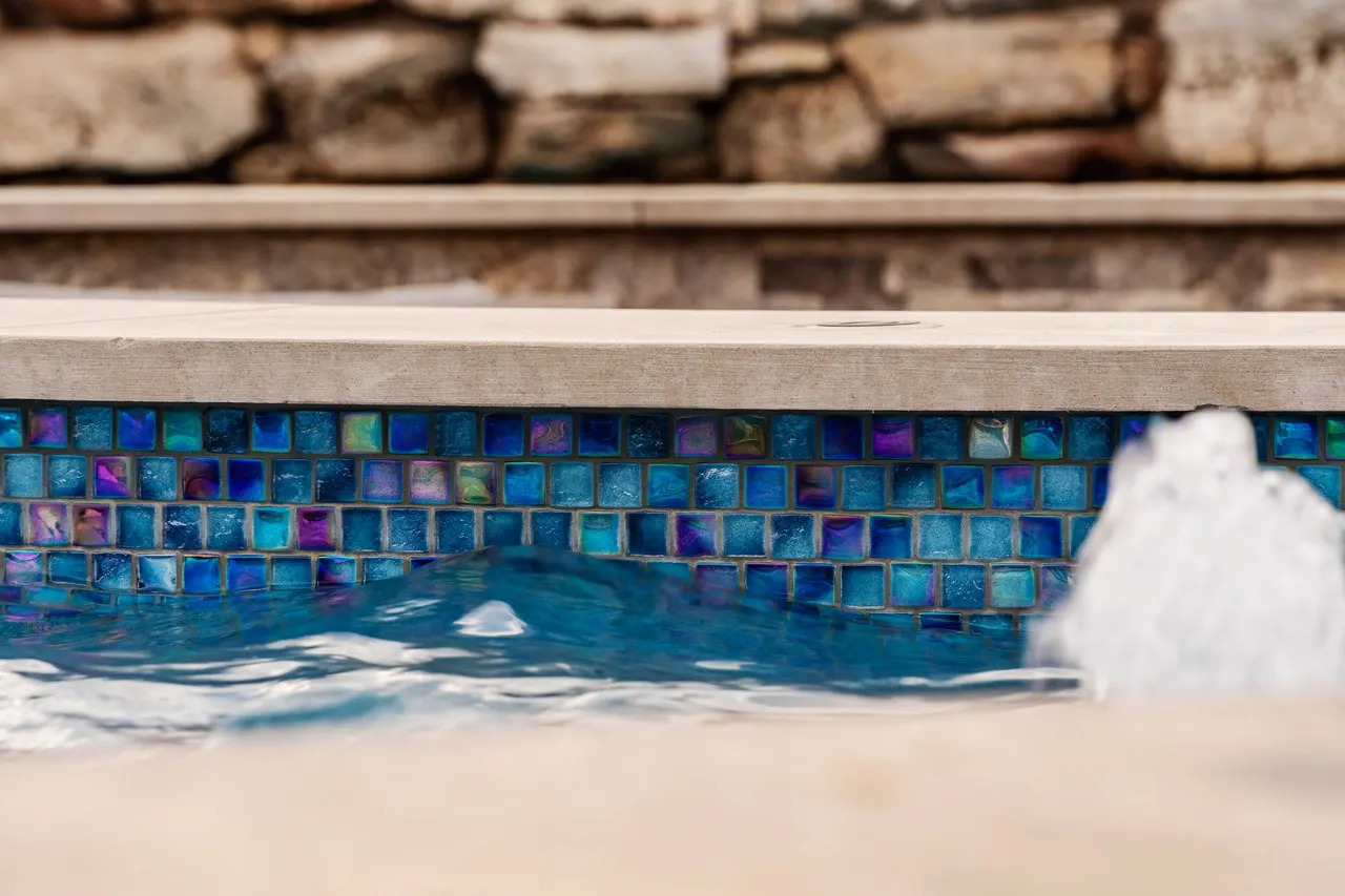 Farmhouse Lagoon — Freeform pool with sunken lounge in Travis County, TX by GB IV Designs (photo 9)