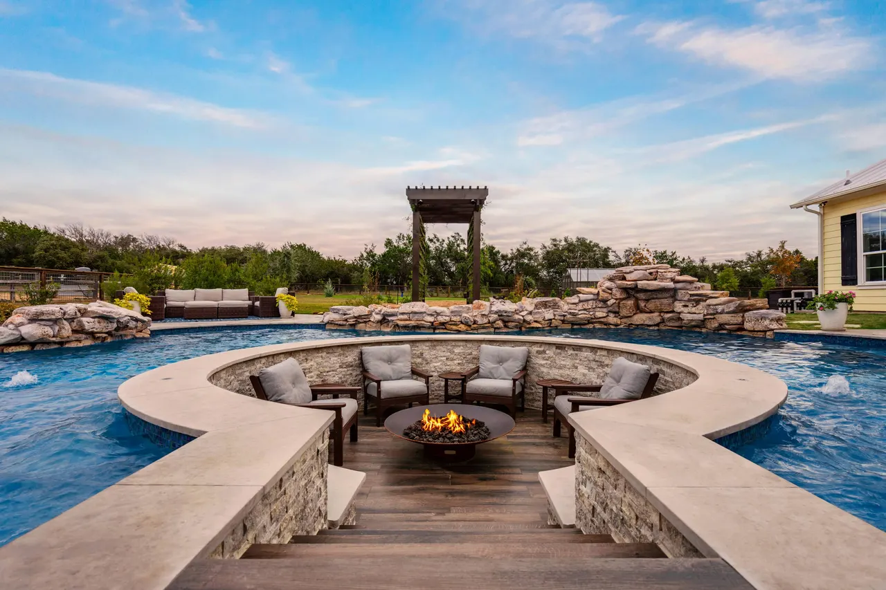 Farmhouse Lagoon — Freeform pool with sunken lounge in Travis County, TX by GB IV Designs (photo 11)
