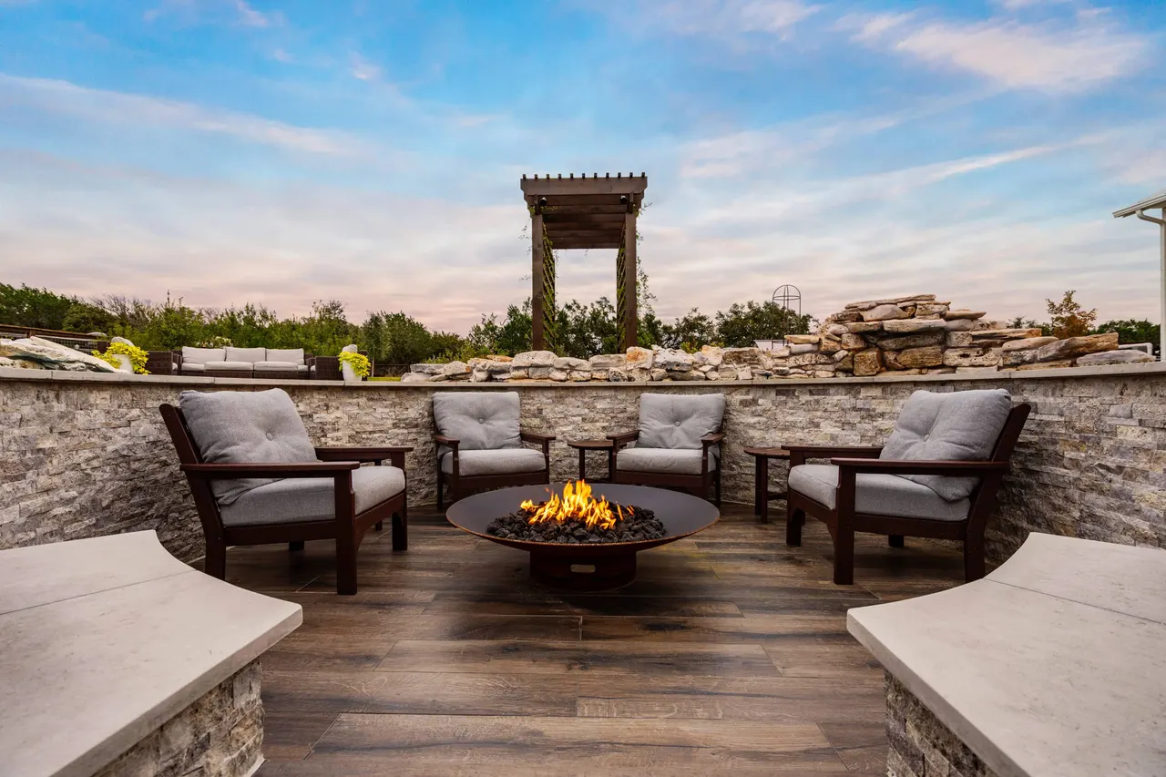 Farmhouse Lagoon — Freeform pool with sunken lounge in Travis County, TX by GB IV Designs (photo 13)