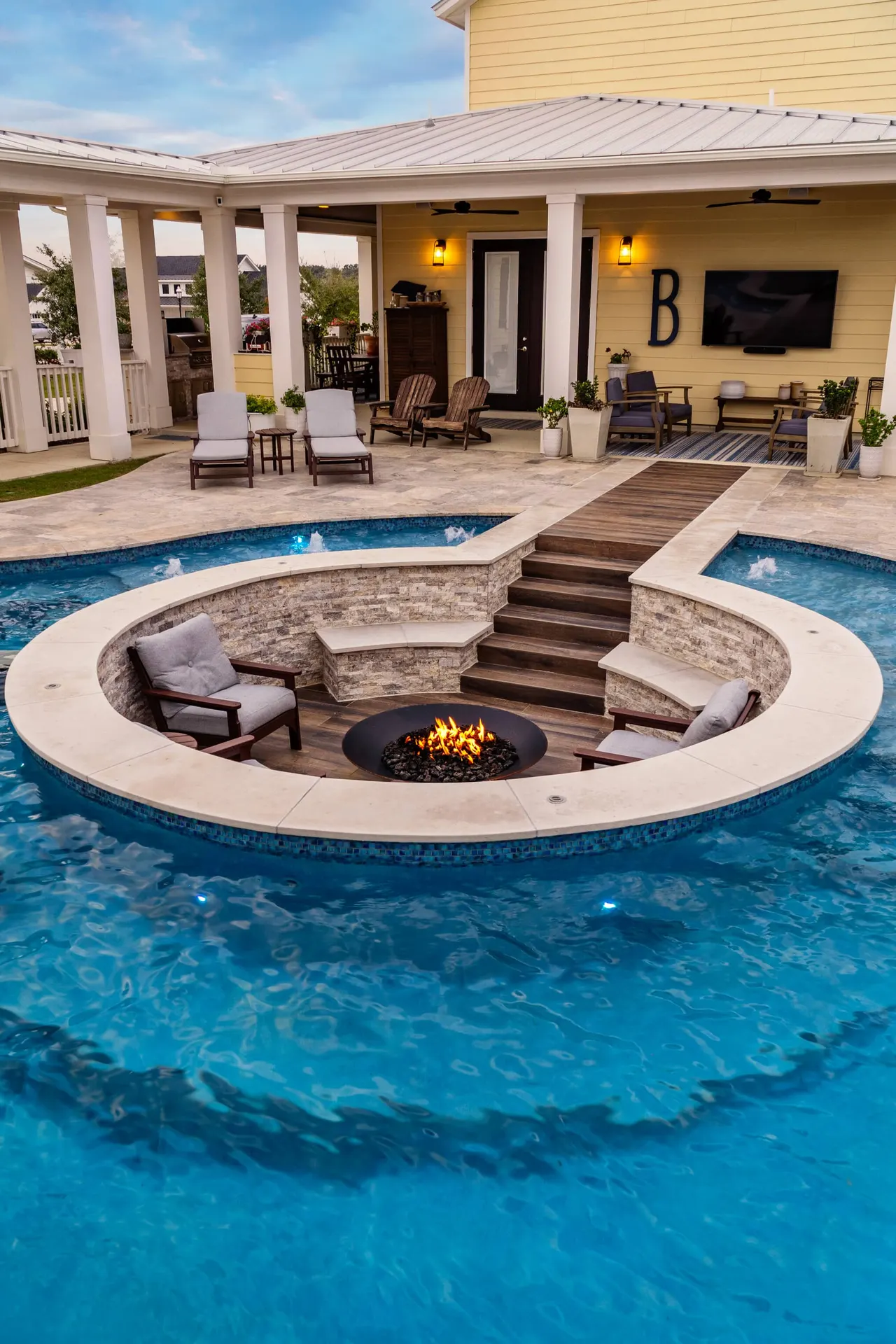Farmhouse Lagoon — Freeform pool with sunken lounge in Travis County, TX by GB IV Designs (photo 22)