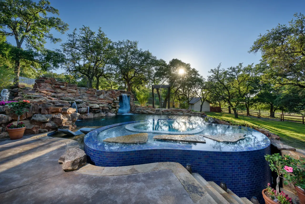 Grotto Waterfall — Freeform pool & grotto in Texas Hill Country, TX by GB IV Designs (photo 3)