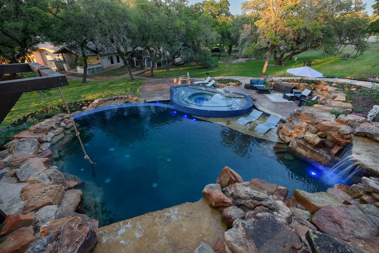 Grotto Waterfall — Freeform pool & grotto in Texas Hill Country, TX by GB IV Designs (photo 8)