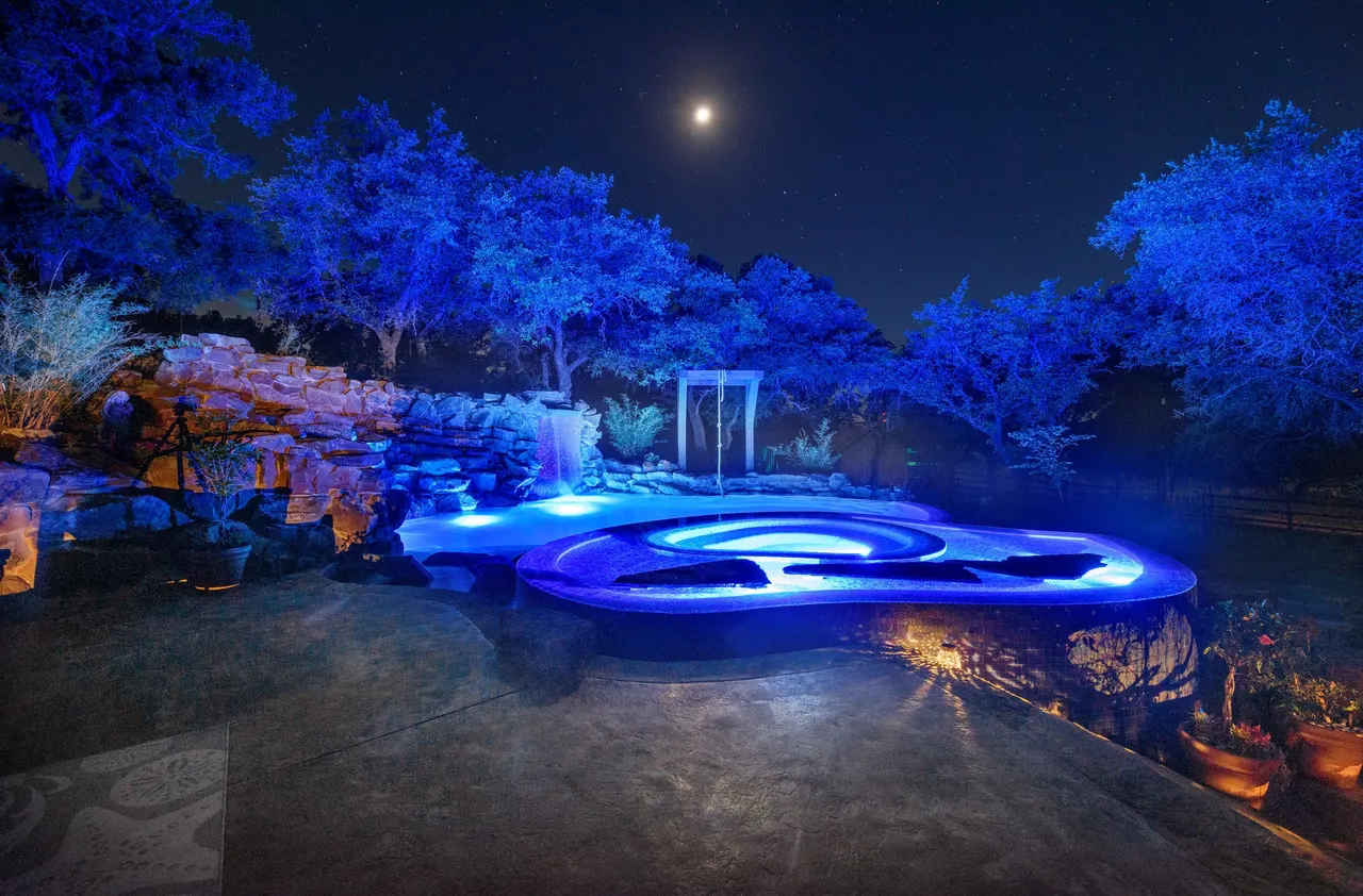 Grotto Waterfall — Freeform pool & grotto in Texas Hill Country, TX by GB IV Designs (photo 10)