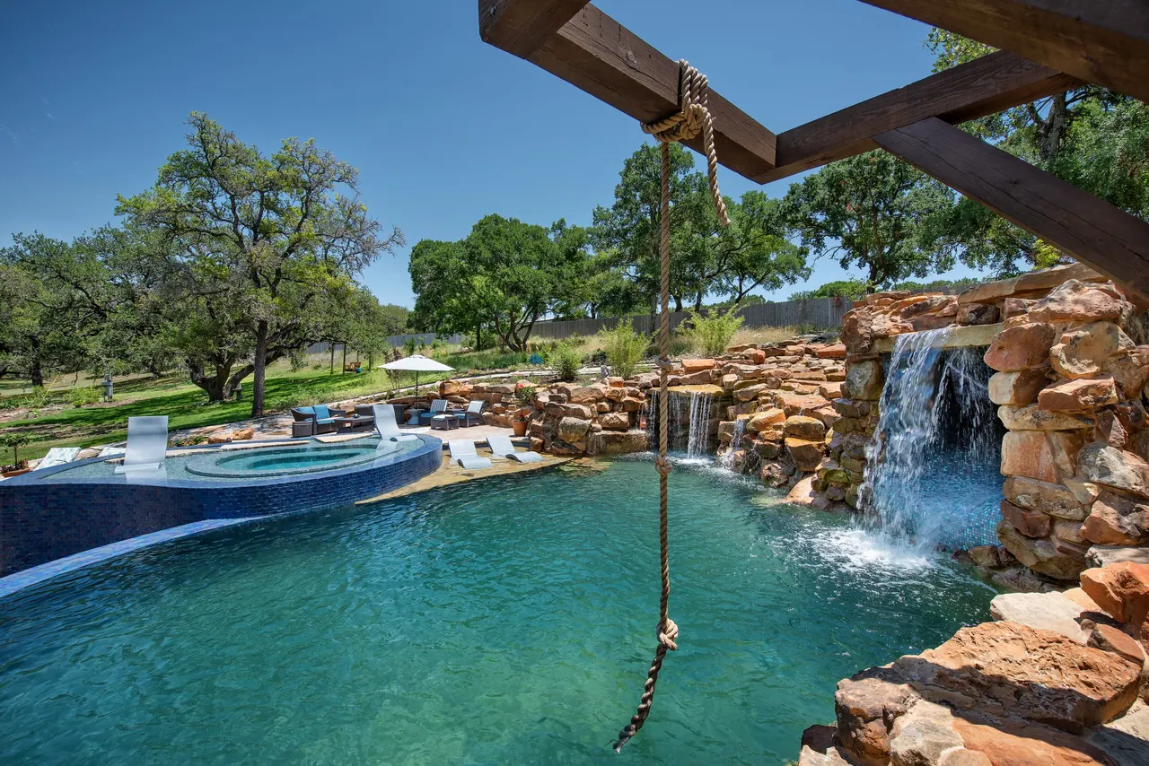 Grotto Waterfall — Freeform pool & grotto in Texas Hill Country, TX by GB IV Designs (photo 14)