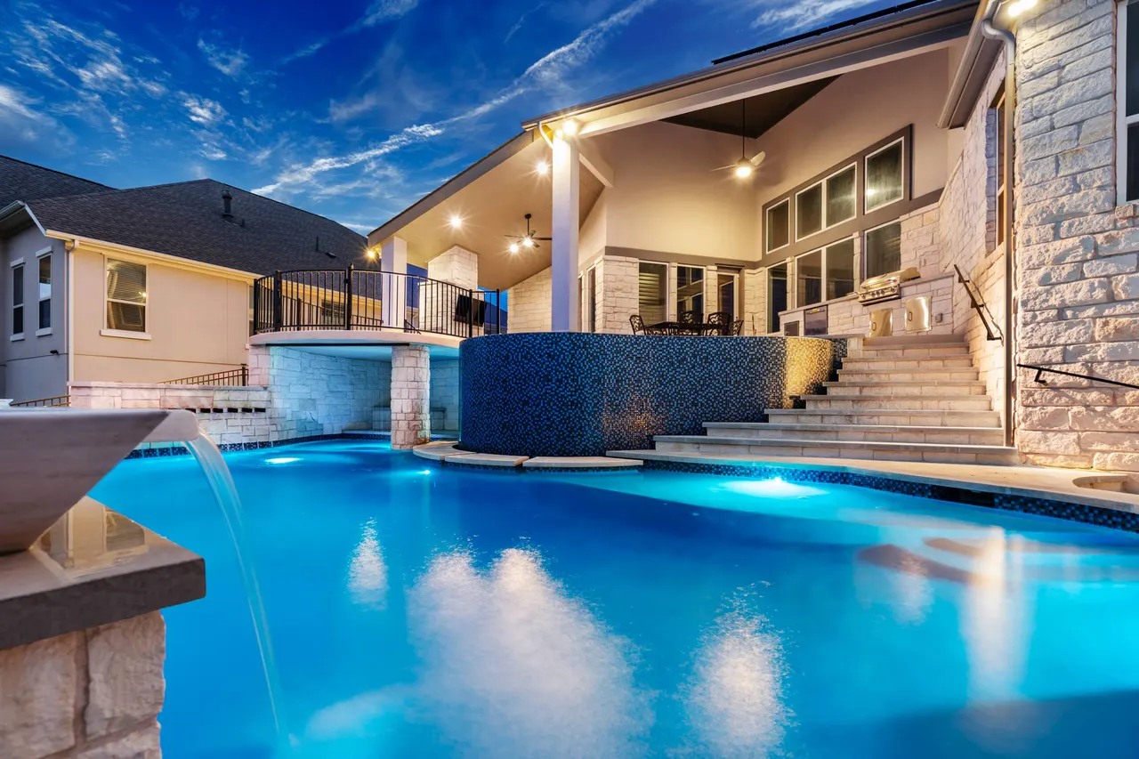 Hilltop Overlook — Freeform vanishing-edge pool in Bee Cave, TX by GB IV Designs