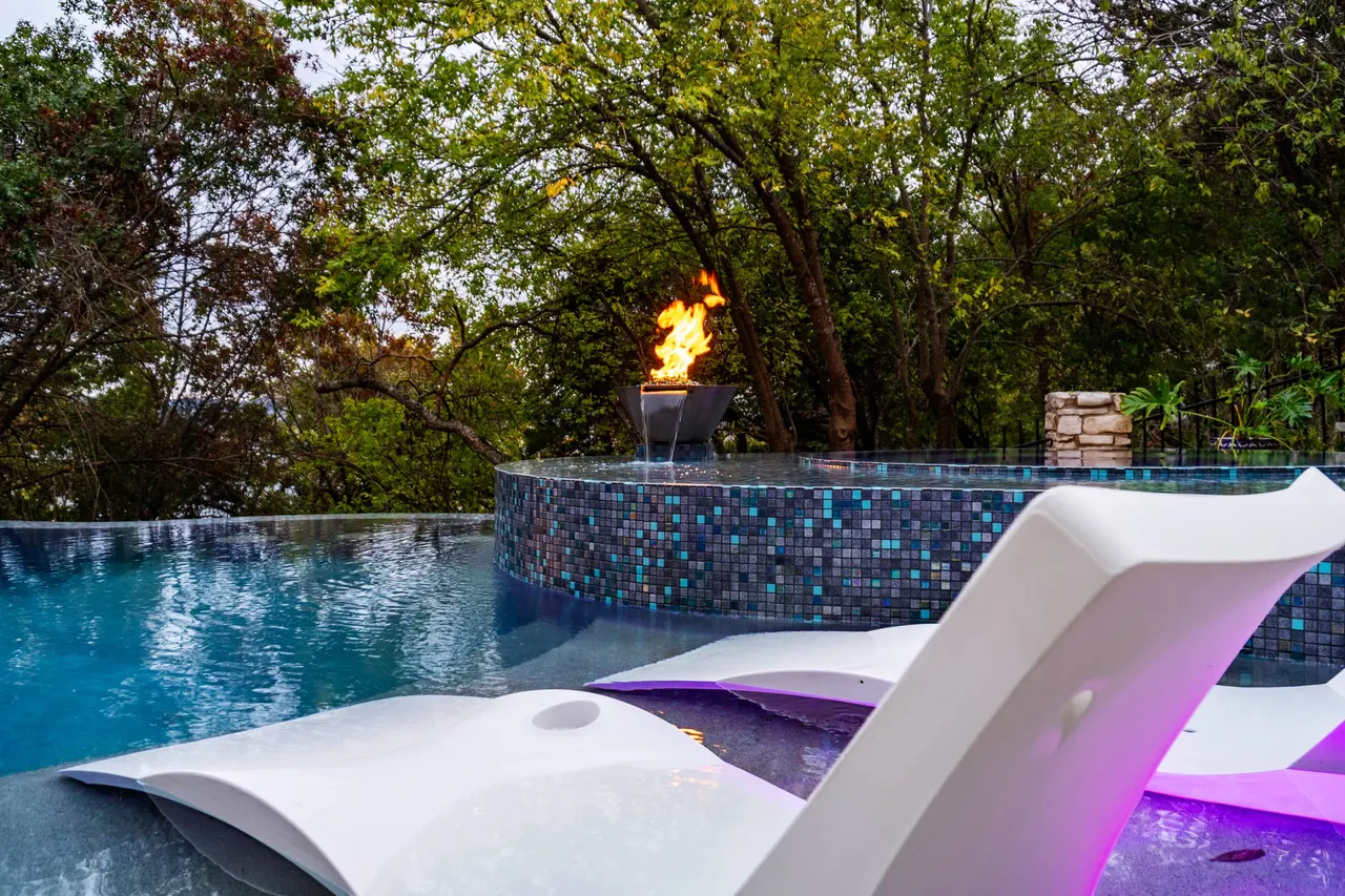 Lakeside Glass — Renovation & vanishing-edge spa in Dripping Springs, TX by GB IV Designs (photo 1)