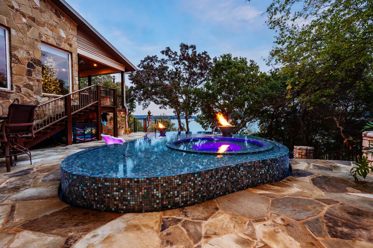 Lakeside Glass — Renovation & vanishing-edge spa in Dripping Springs, Texas, by GB IV Designs
