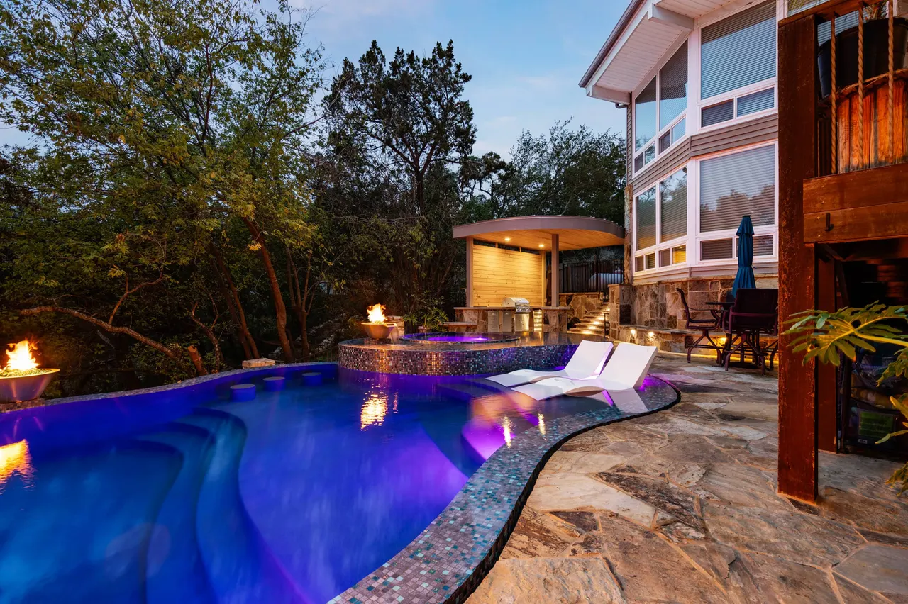 Lakeside Glass — Renovation & vanishing-edge spa in Dripping Springs, Texas, by GB IV Designs