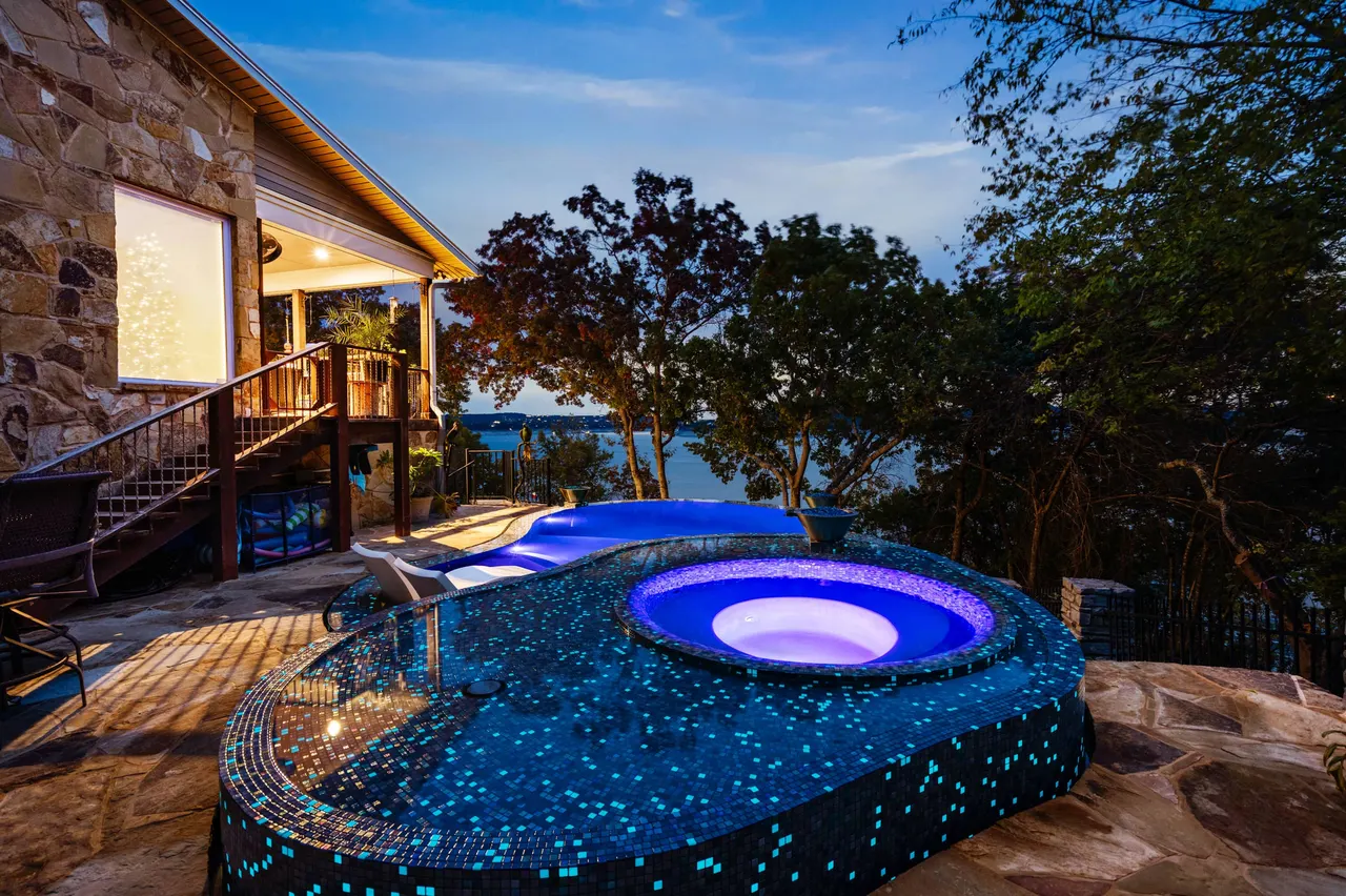 Lakeside Glass — Renovation & vanishing-edge spa in Dripping Springs, Texas, by GB IV Designs