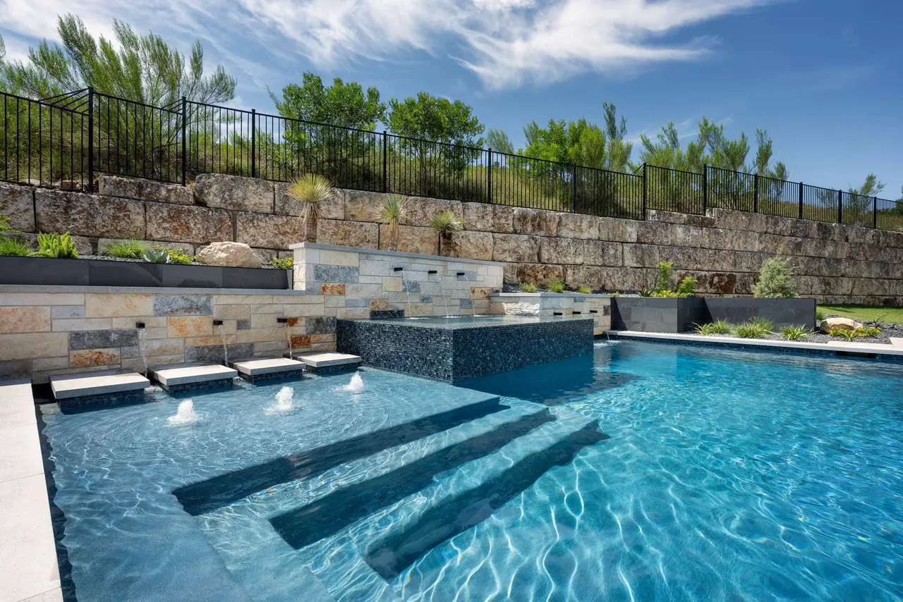 Limestone Terrace — Geometric pool with raised spa in Austin, TX by GB IV Designs (photo 3)