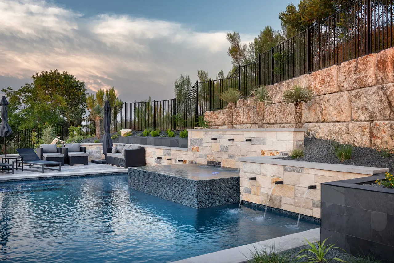 Limestone Terrace — Geometric pool with raised spa in Austin, TX by GB IV Designs