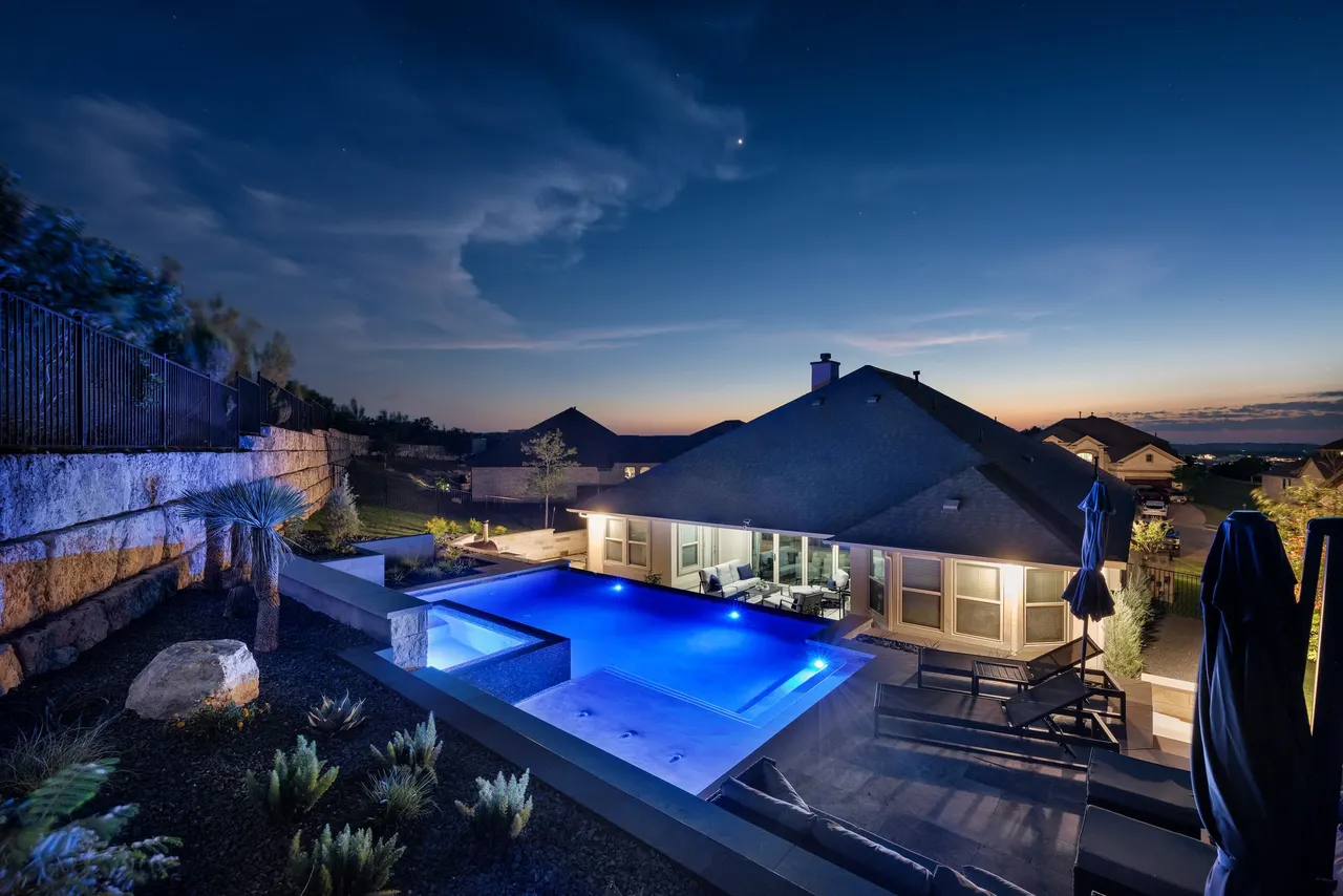Limestone Terrace — Geometric pool with raised spa in Austin, TX by GB IV Designs