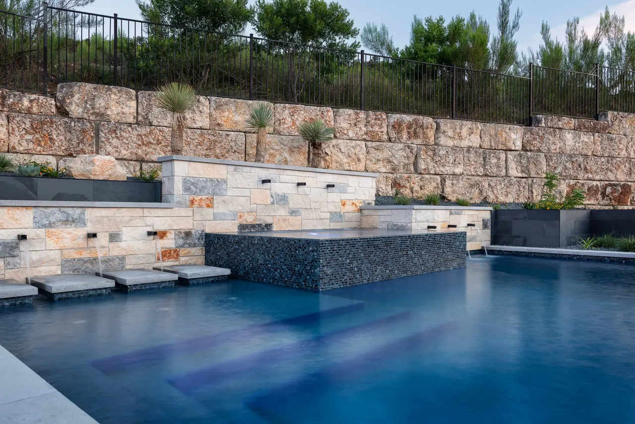 Limestone Terrace — Geometric pool with raised spa in Austin, TX by GB IV Designs (photo 11)