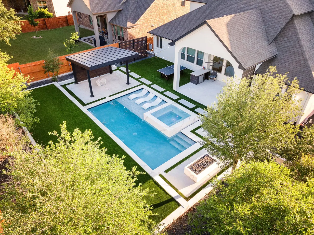 Marble Courtyard — Compact modern pool in Dripping Springs, TX by GB IV Designs (photo 3)