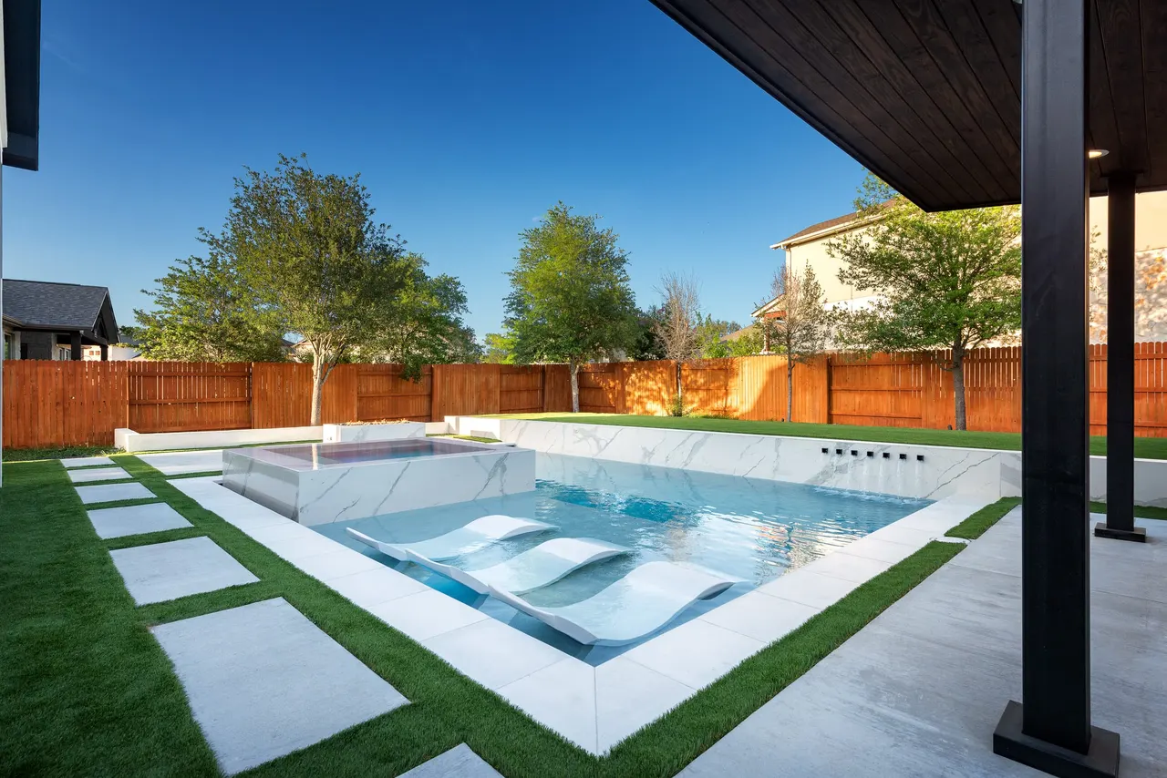 Marble Courtyard — Compact modern pool in Dripping Springs, TX by GB IV Designs