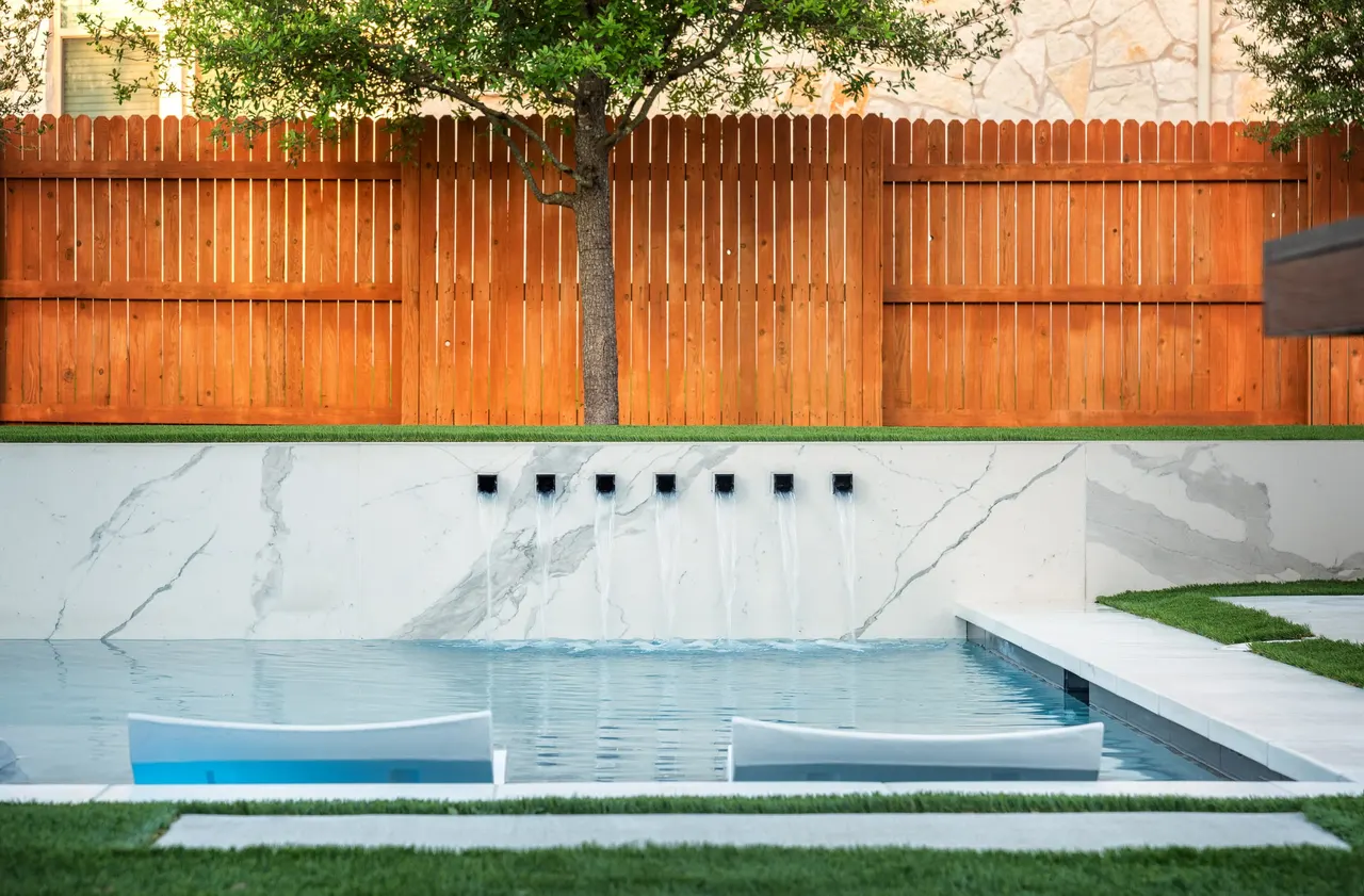 Marble Courtyard — Compact modern pool in Dripping Springs, TX by GB IV Designs (photo 7)