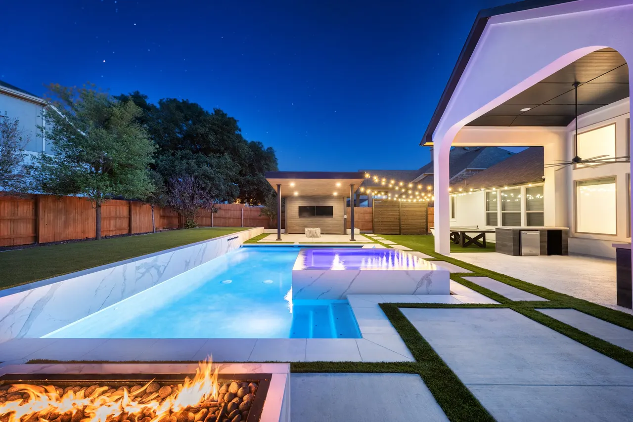 Marble Courtyard — Compact modern pool in Dripping Springs, TX by GB IV Designs (photo 8)