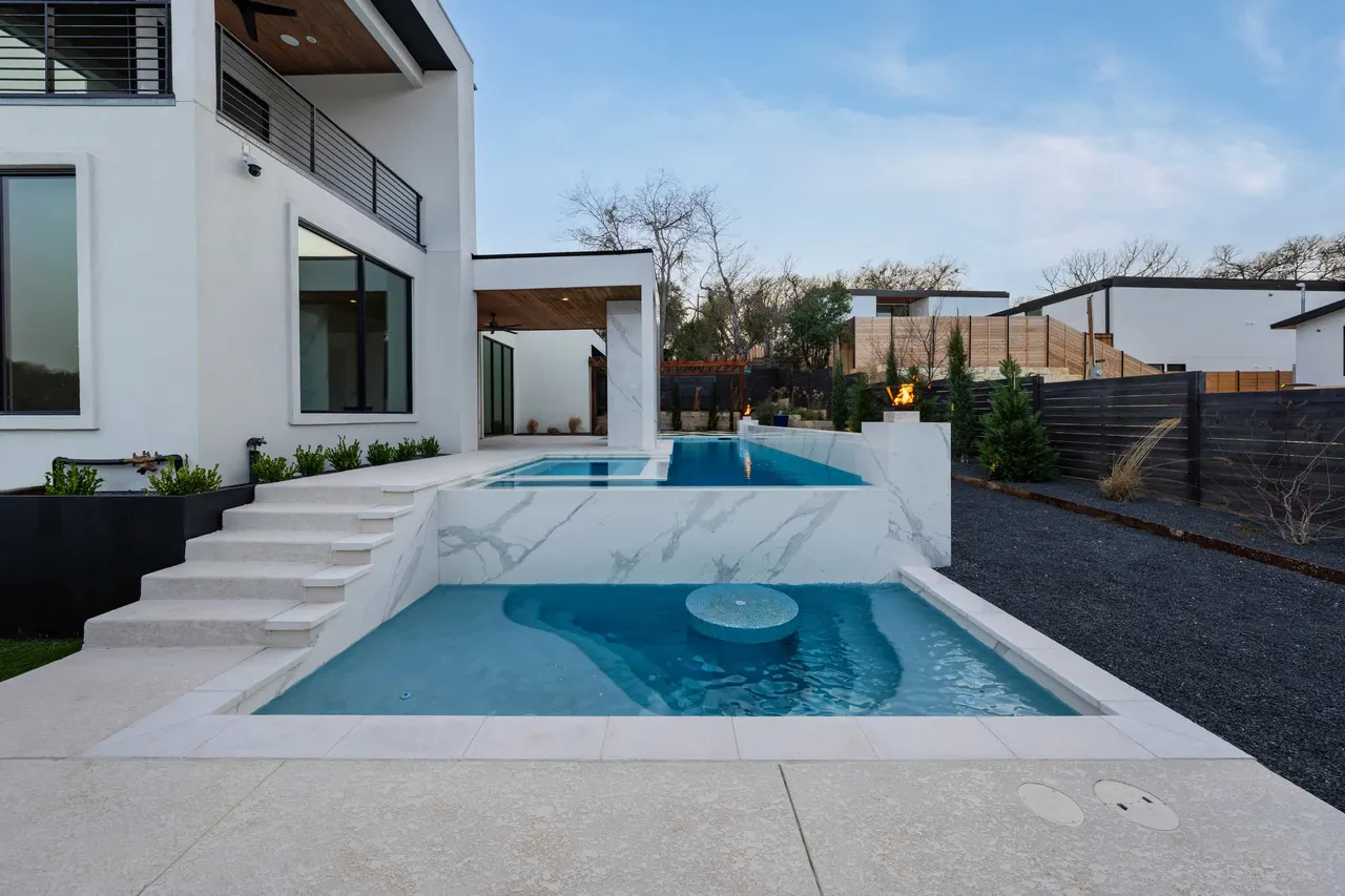 Porcelain Modern — Raised pool & outdoor living in Austin, Texas, by GB IV Designs