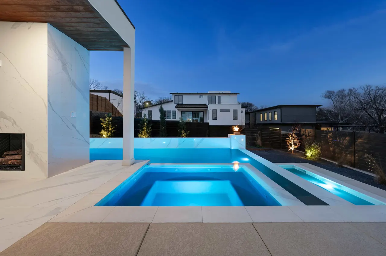 Porcelain Modern — Raised pool & outdoor living in Austin, TX by GB IV Designs