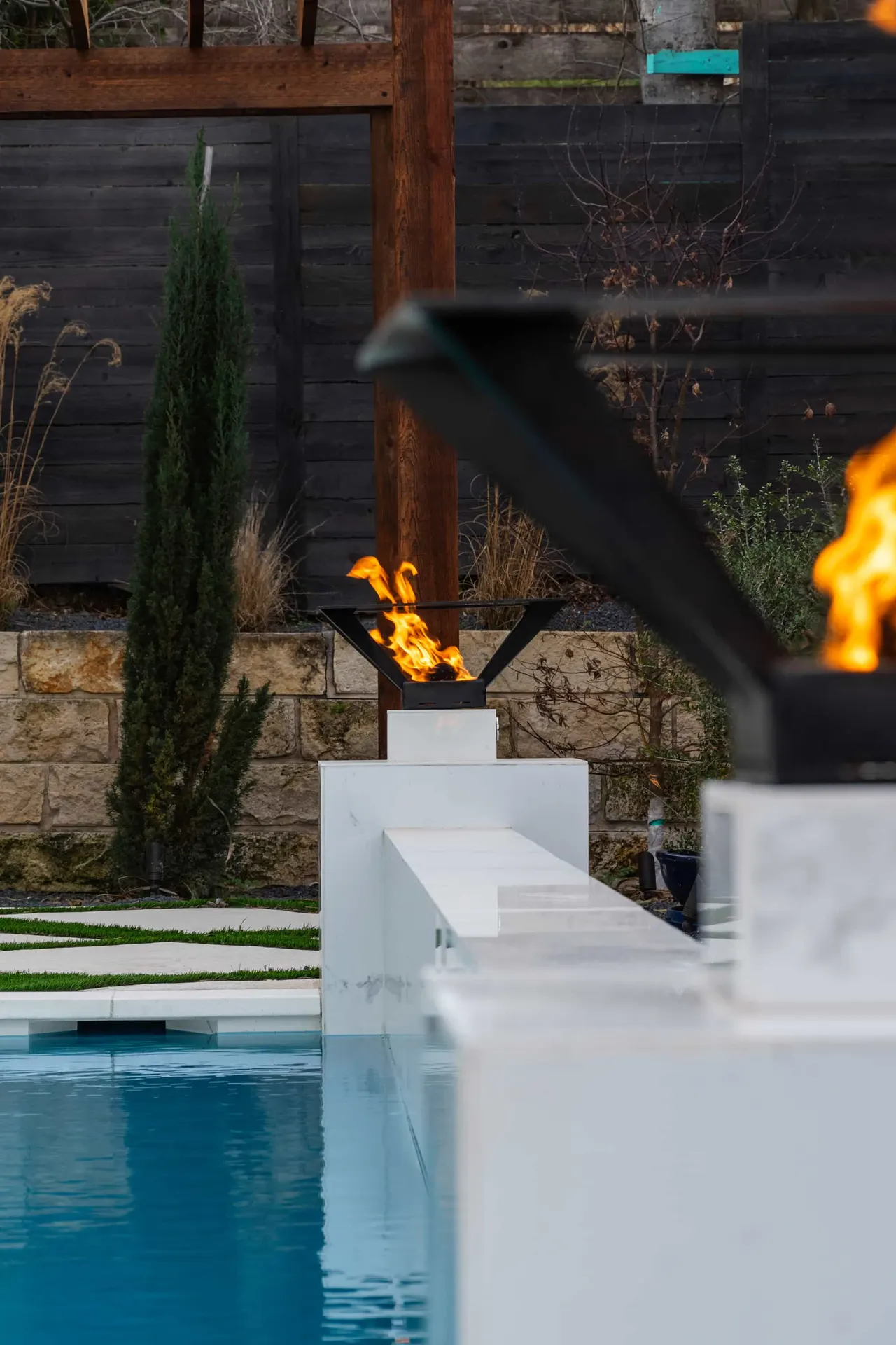 Porcelain Modern — Raised pool & outdoor living in Austin, TX by GB IV Designs (photo 11)