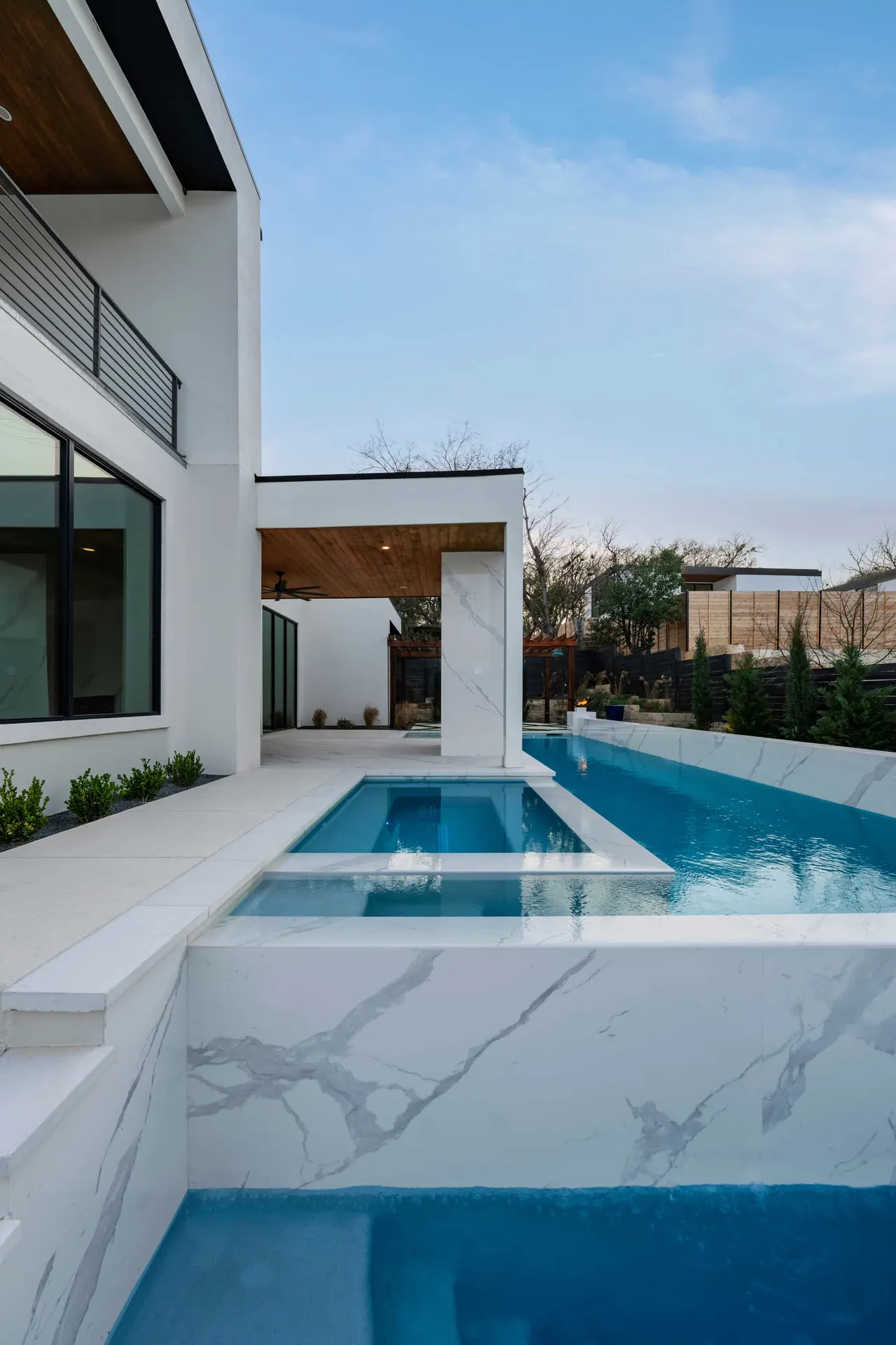 Porcelain Modern — Raised pool & outdoor living in Austin, Texas, by GB IV Designs