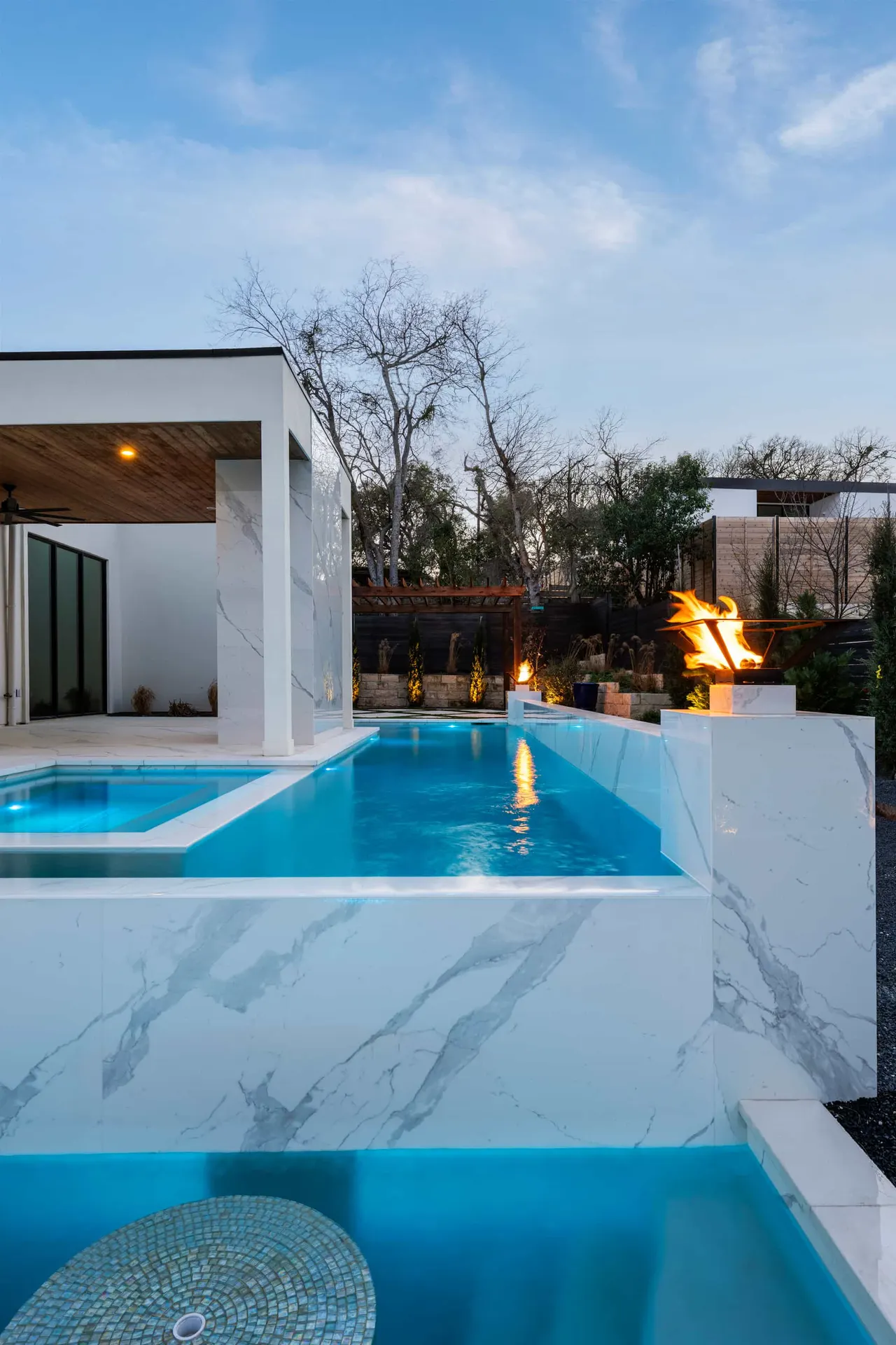 Porcelain Modern — Raised pool & outdoor living in Austin, TX by GB IV Designs (photo 16)