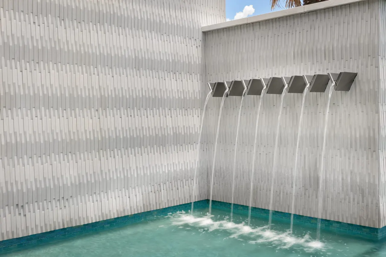 Sculpted Water Walls — Contemporary pool with water features in Bee Cave, TX by GB IV Designs (photo 3)