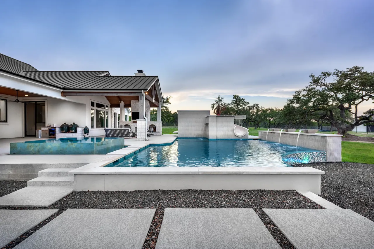 Sculpted Water Walls — Contemporary pool with water features in Bee Cave, TX by GB IV Designs
