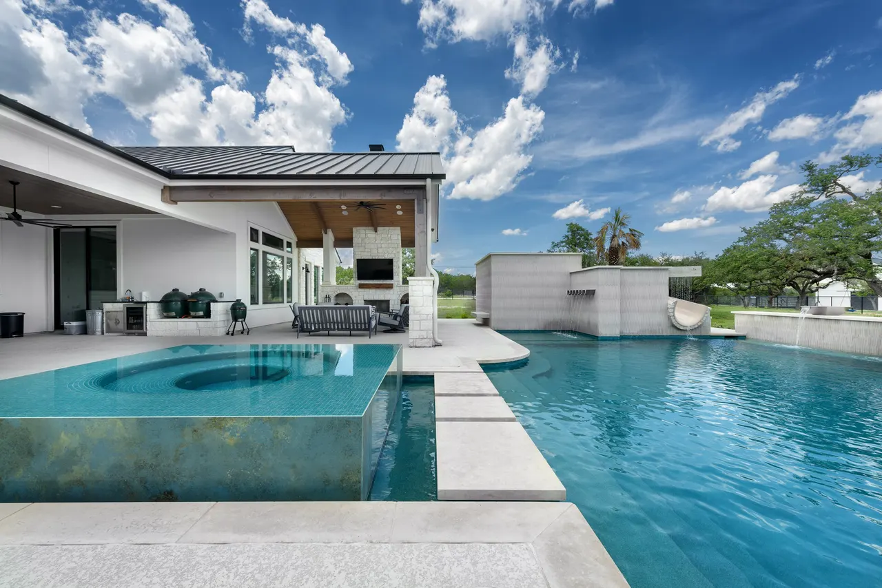 Sculpted Water Walls — Contemporary pool with water features in Bee Cave, TX by GB IV Designs (photo 15)