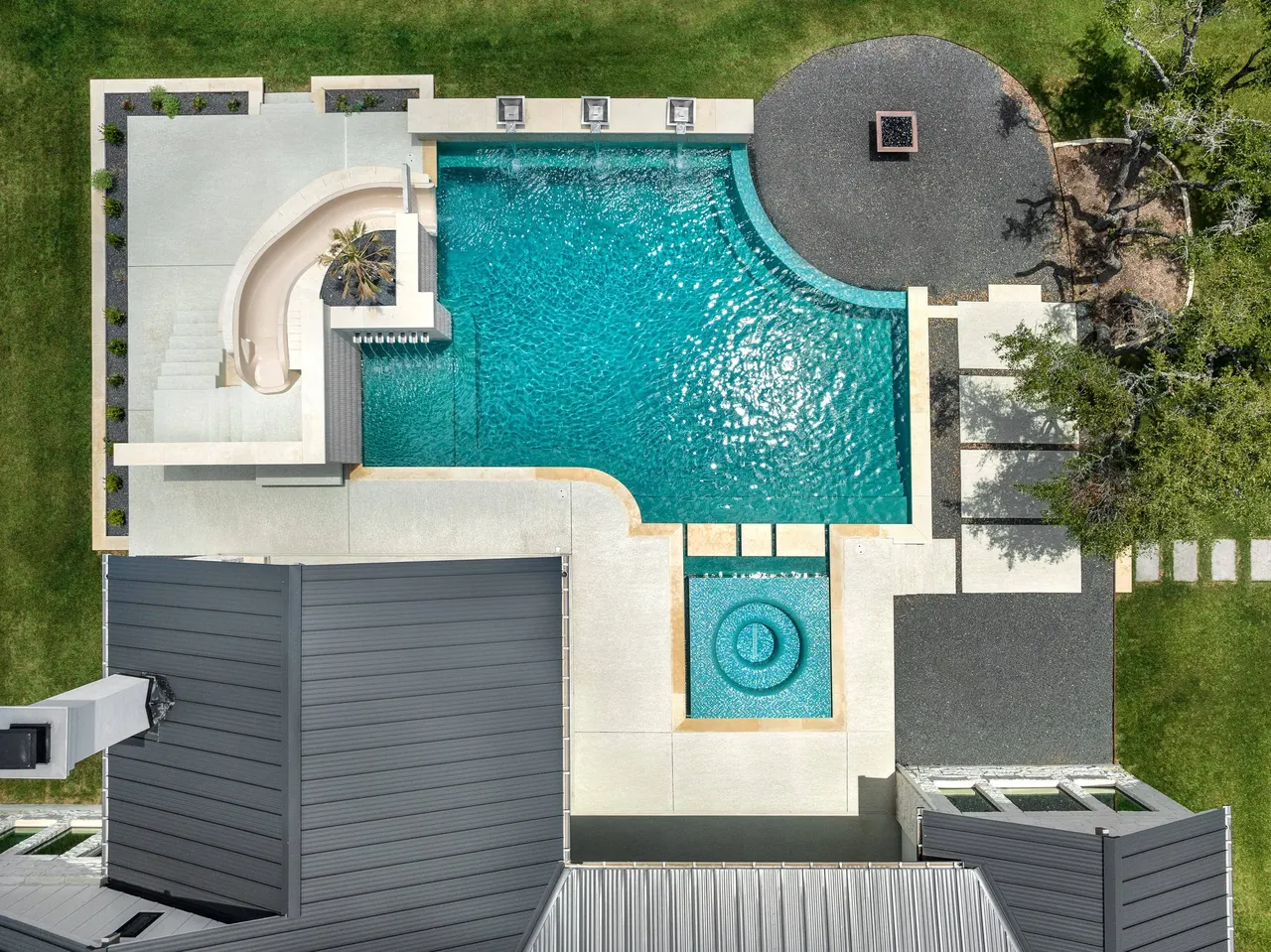 Sculpted Water Walls — Contemporary pool with water features in Bee Cave, TX by GB IV Designs (photo 16)