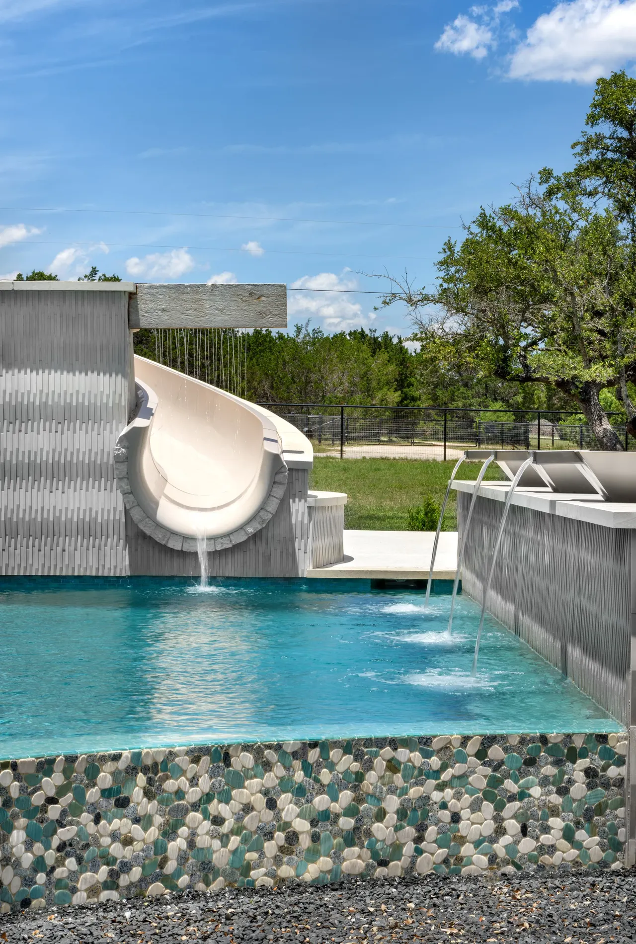 Sculpted Water Walls — Contemporary pool with water features in Bee Cave, TX by GB IV Designs (photo 17)