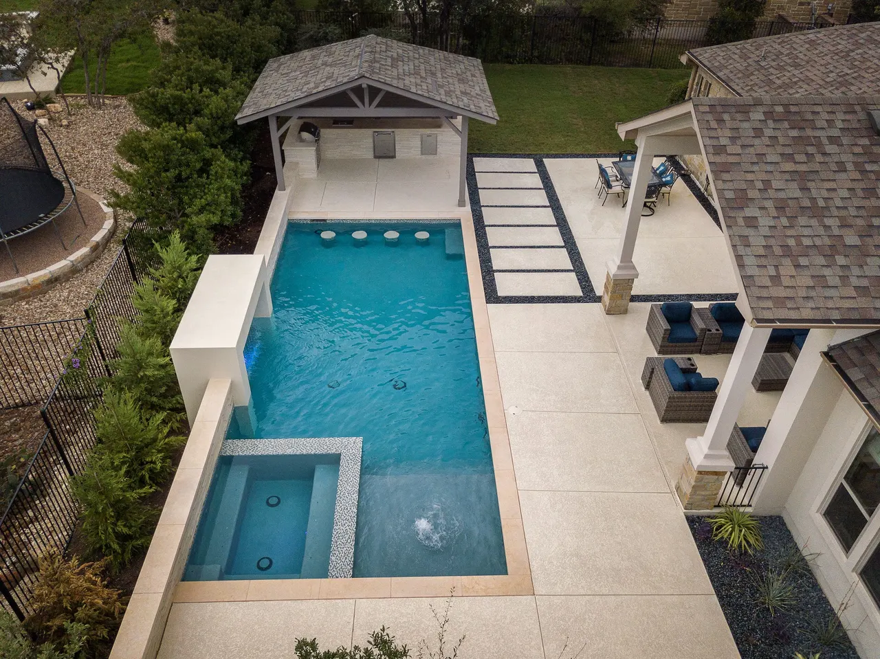 Tiered Geometric — Geometric pool & spa in Dripping Springs, TX by GB IV Designs (photo 1)