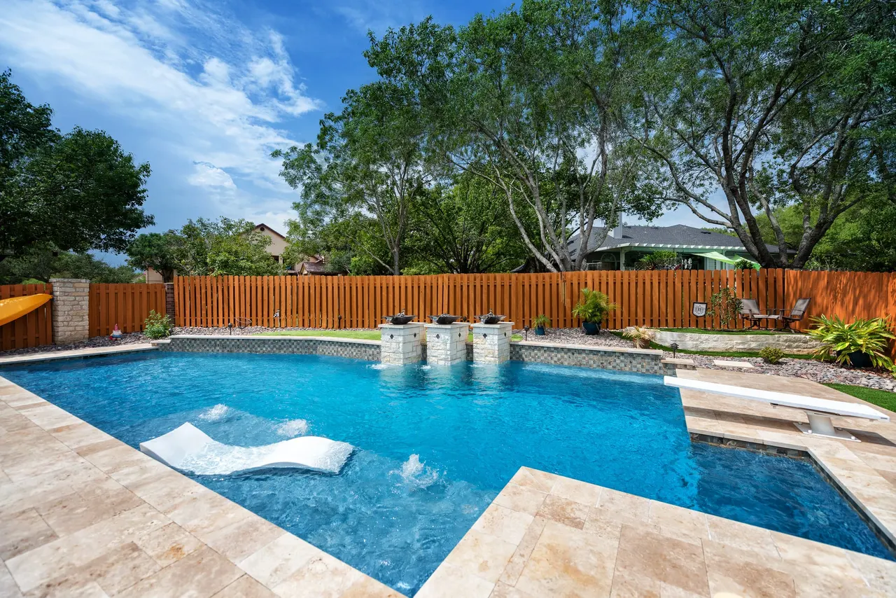 Travertine Lap — Lap pool & spa in Bee Cave, TX by GB IV Designs