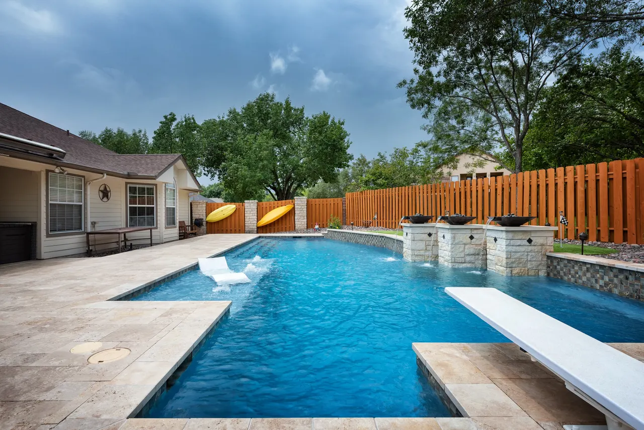 Travertine Lap — Lap pool & spa in Bee Cave, TX by GB IV Designs (photo 7)