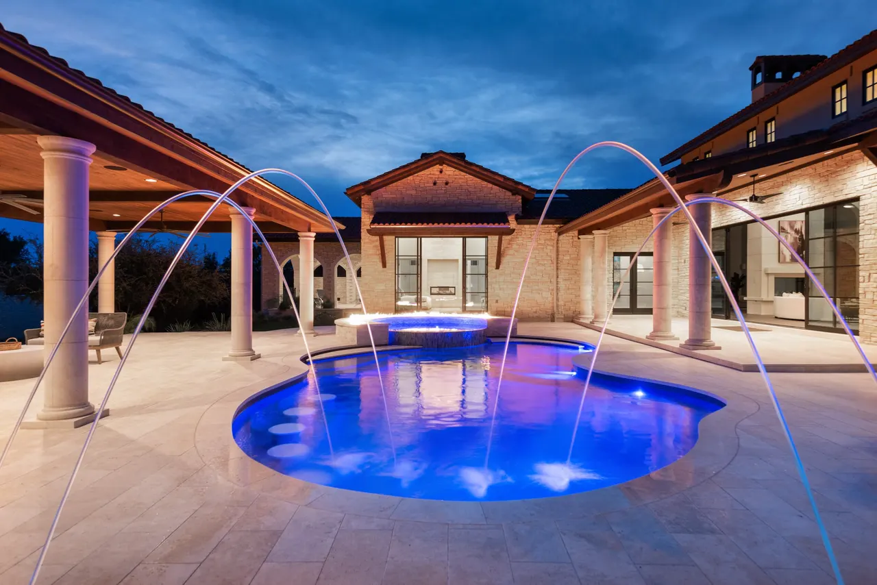 Villa Courtyard — Freeform pool & spa in Austin, TX by GB IV Designs