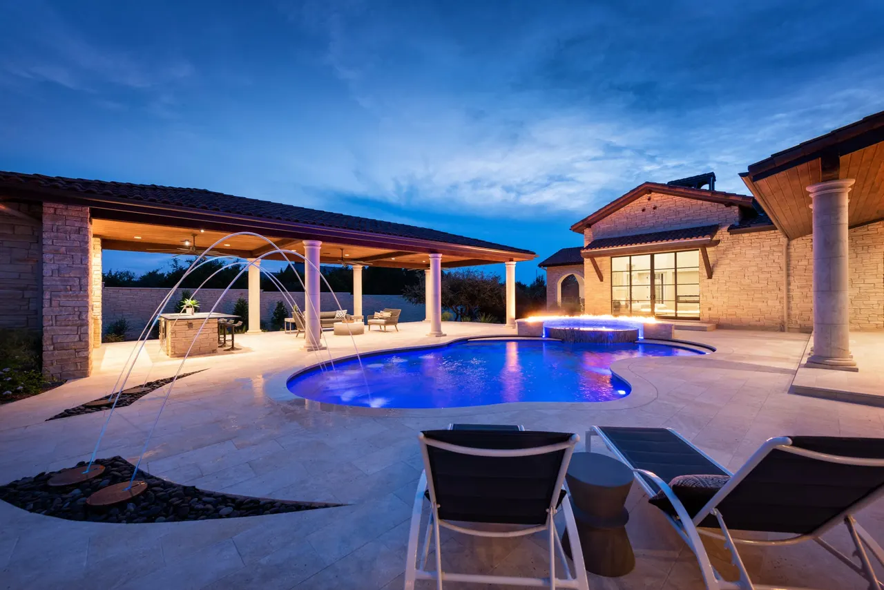 Villa Courtyard — Freeform pool & spa in Austin, TX by GB IV Designs